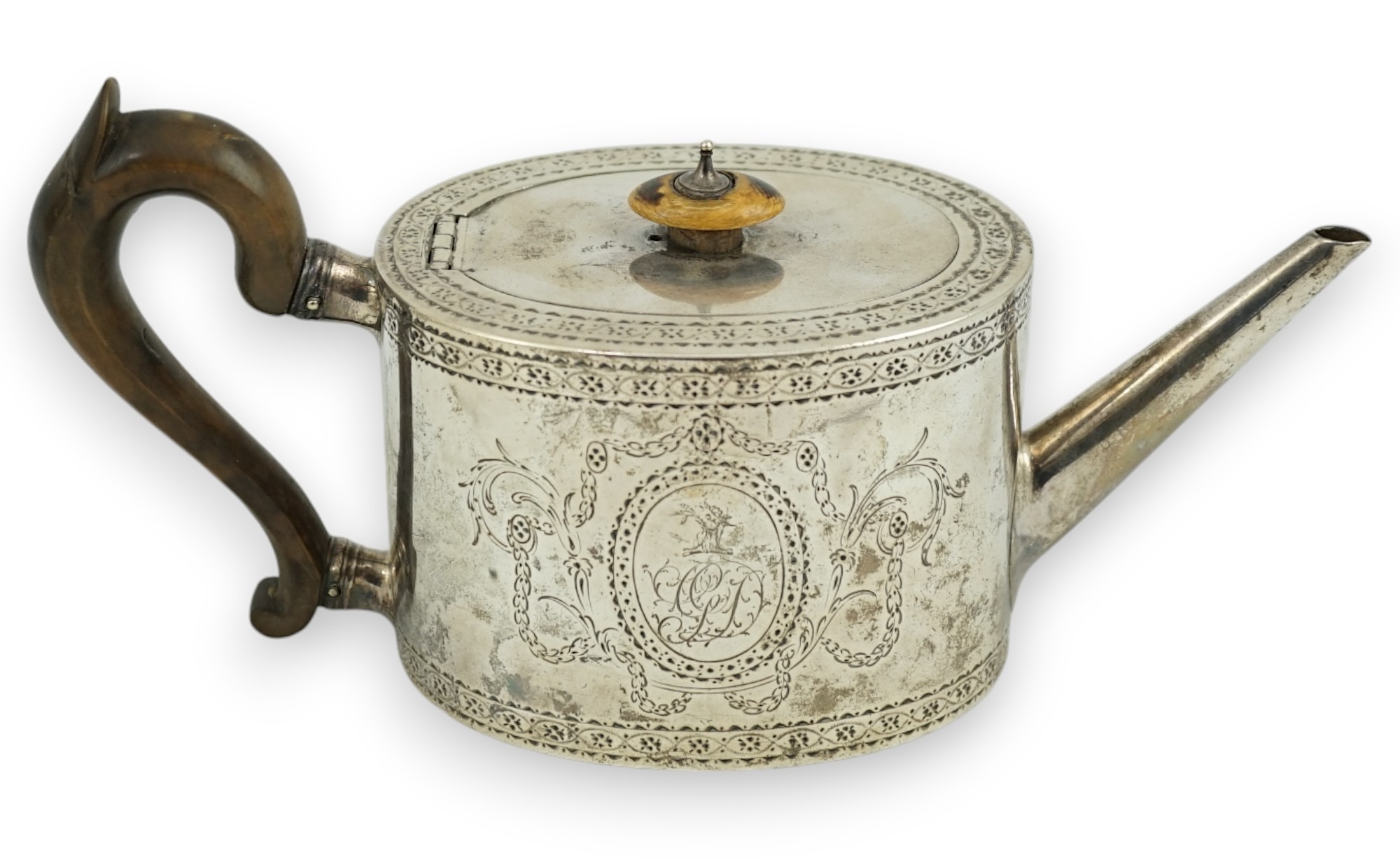 A George III engraved silver oval teapot, London, 1777, gross weight 16.5oz. CITES Submission reference KVNULT5X